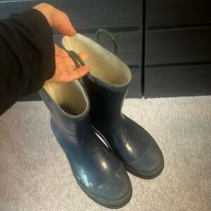 boots for wet weather, walking through puddles. there are scuffs. see photo